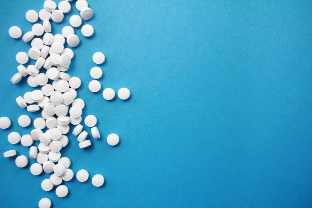 White pills with copy space.
