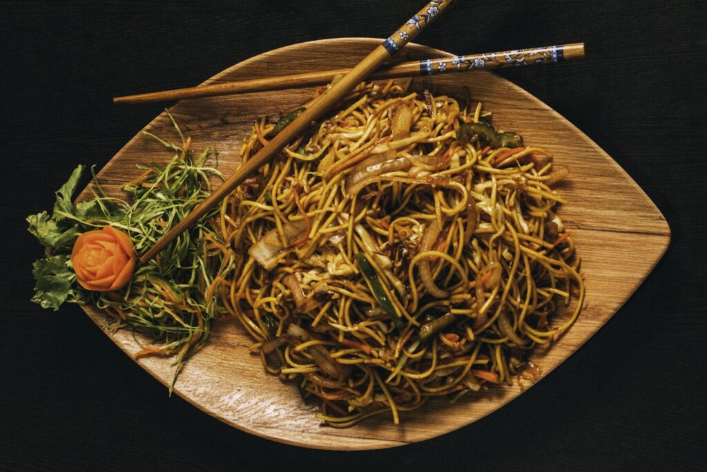 pasta dish on brown ceramic plate