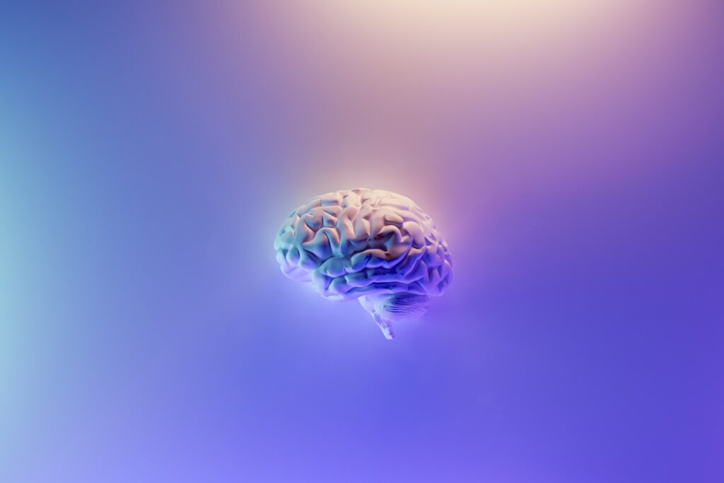 iridescent brain render on blue purple background